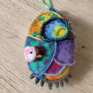 Boutique: Colorful Beaded Fabric Easter egg ornament with chicken bead.